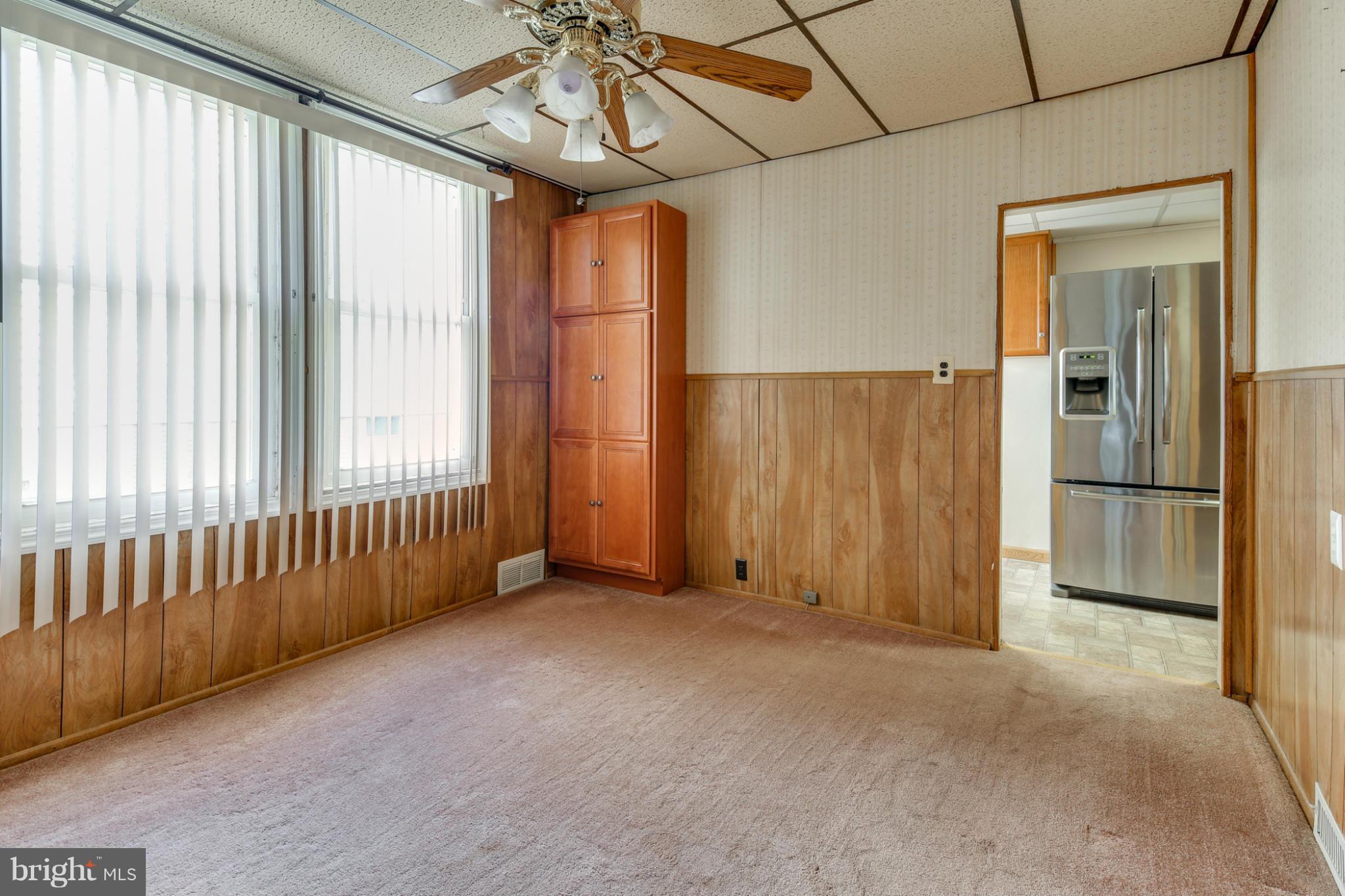 4117 Old Washington Road Baltimore, MD 21227 - Photo 4 of 27 a view of an empty room with a window