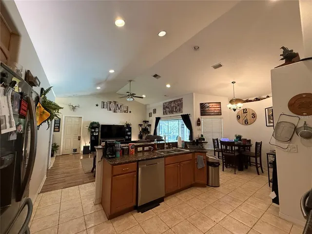 a large kitchen with lots of counter space and appliances