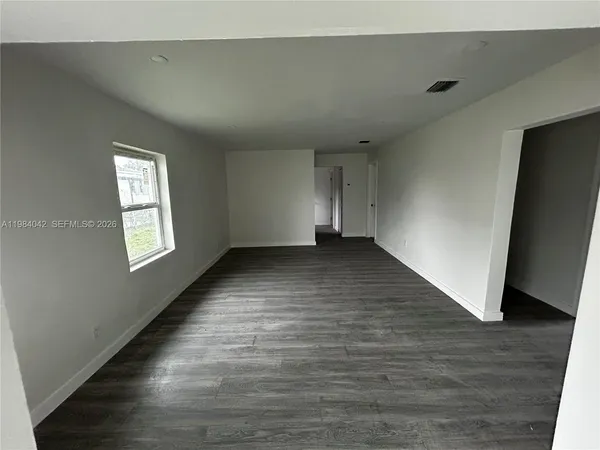 a view of a bathroom with a glass door
