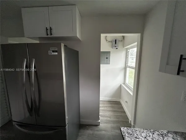 a view of an empty room and window