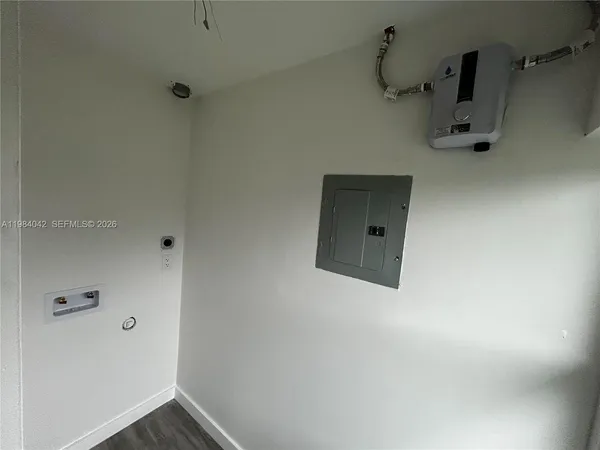 a view of entryway with wooden floor