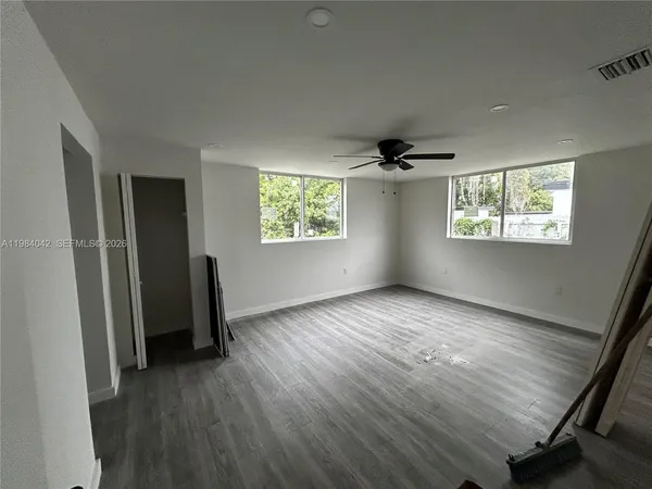a bathroom with a toilet a sink and bathtub