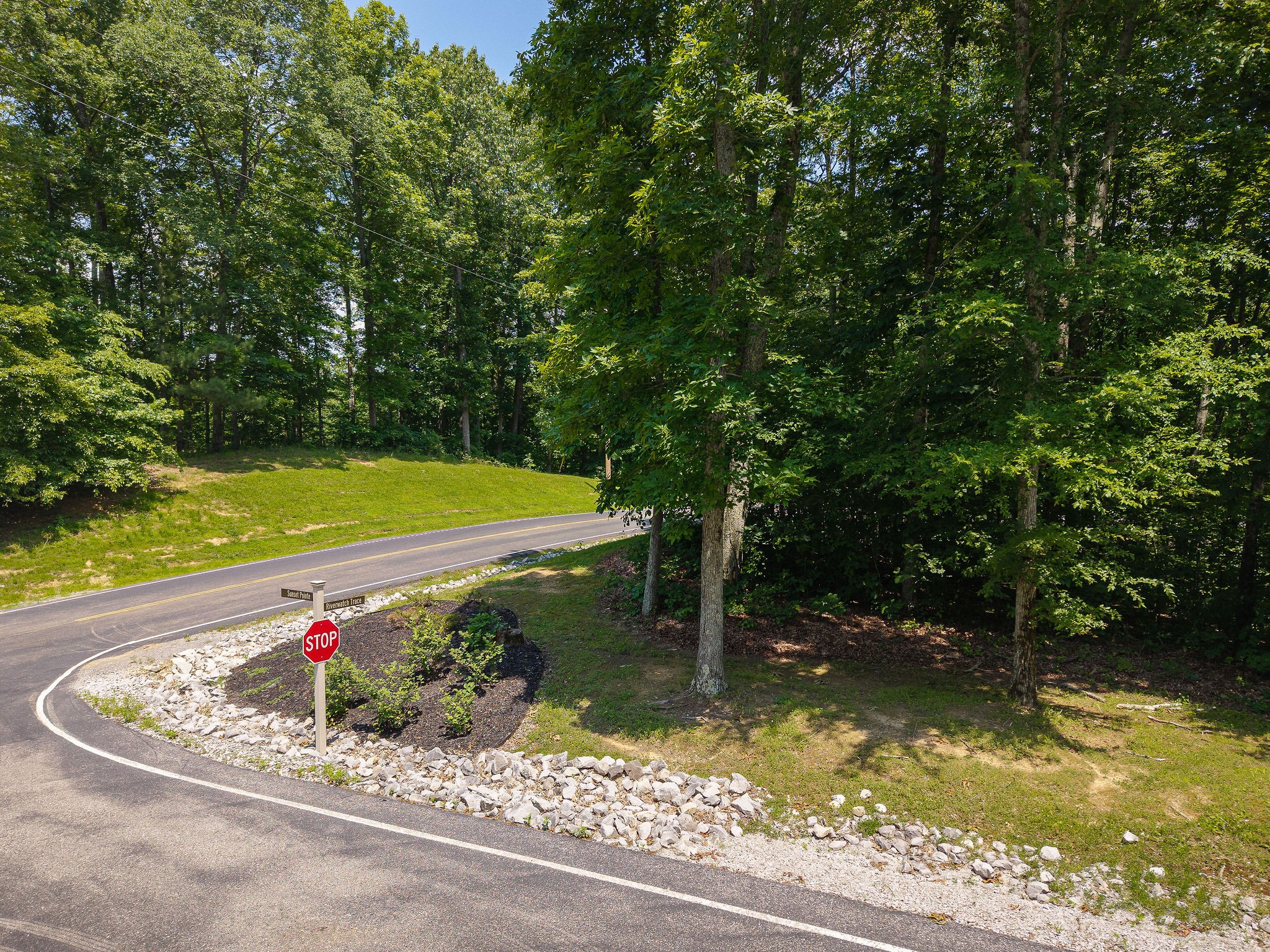 0 Sunset Pointe Sparta, TN 38583 - Photo 6 of 13 a view of a wooden house with a yard