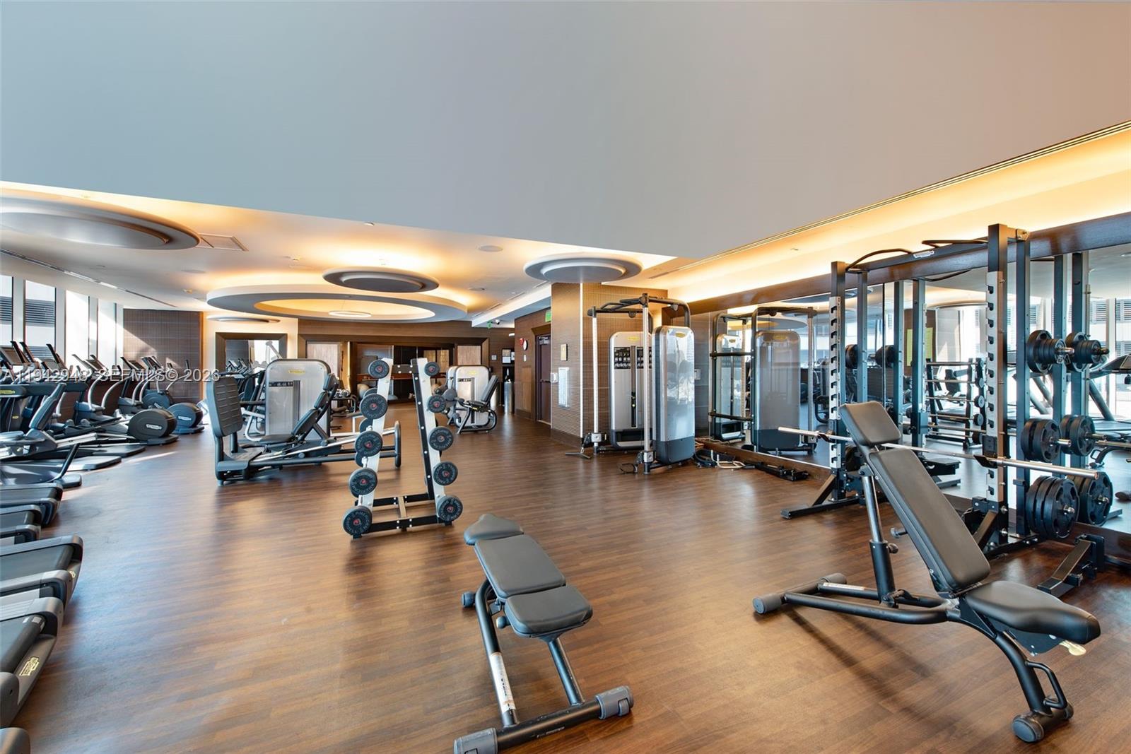 200 Biscayne Blvd Way, Unit 502 Miami, FL 33131 - Photo 22 of 23 a view of a room with gym equipment