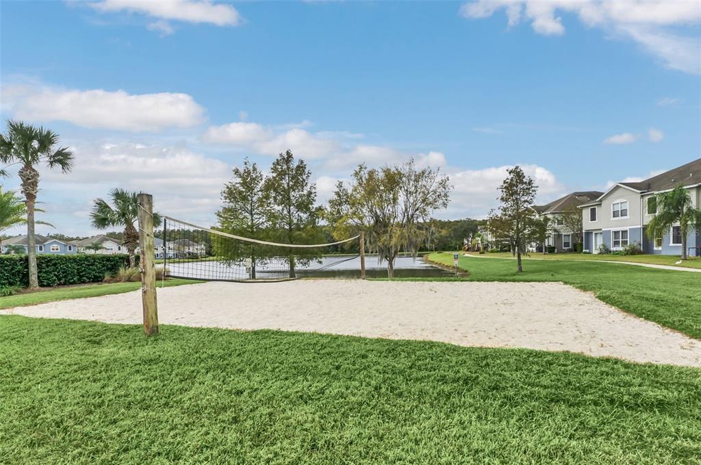 6458 South Goldenrod Road, Unit 29B Orlando, FL 32822 - Photo 39 of 40 a view of a yard with palm trees