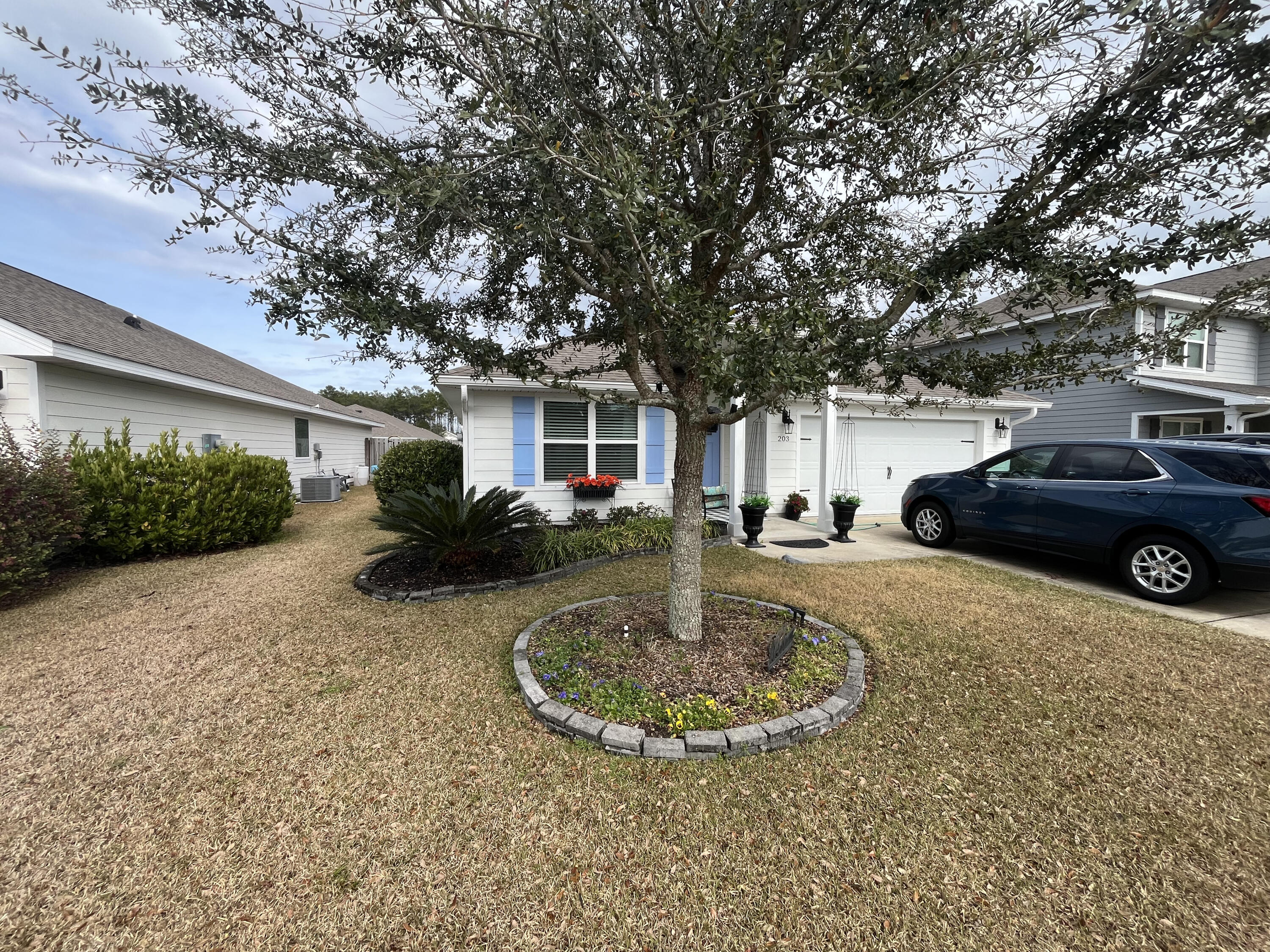 203 This Way Freeport, FL 32439 - Photo 1 of 29 a view of a house with a patio