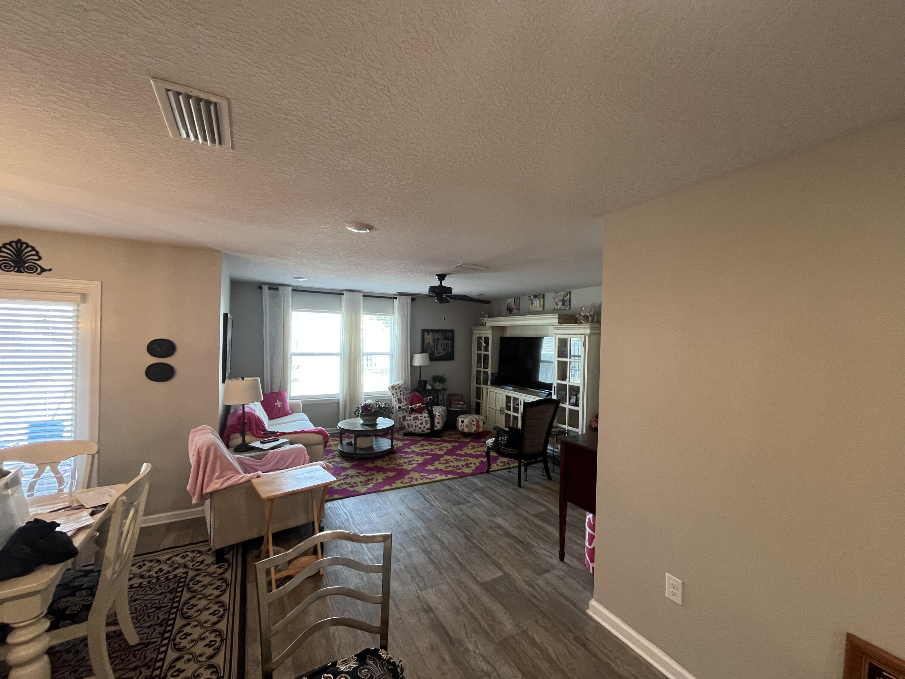 203 This Way Freeport, FL 32439 - Photo 13 of 29 a living room with furniture and a window