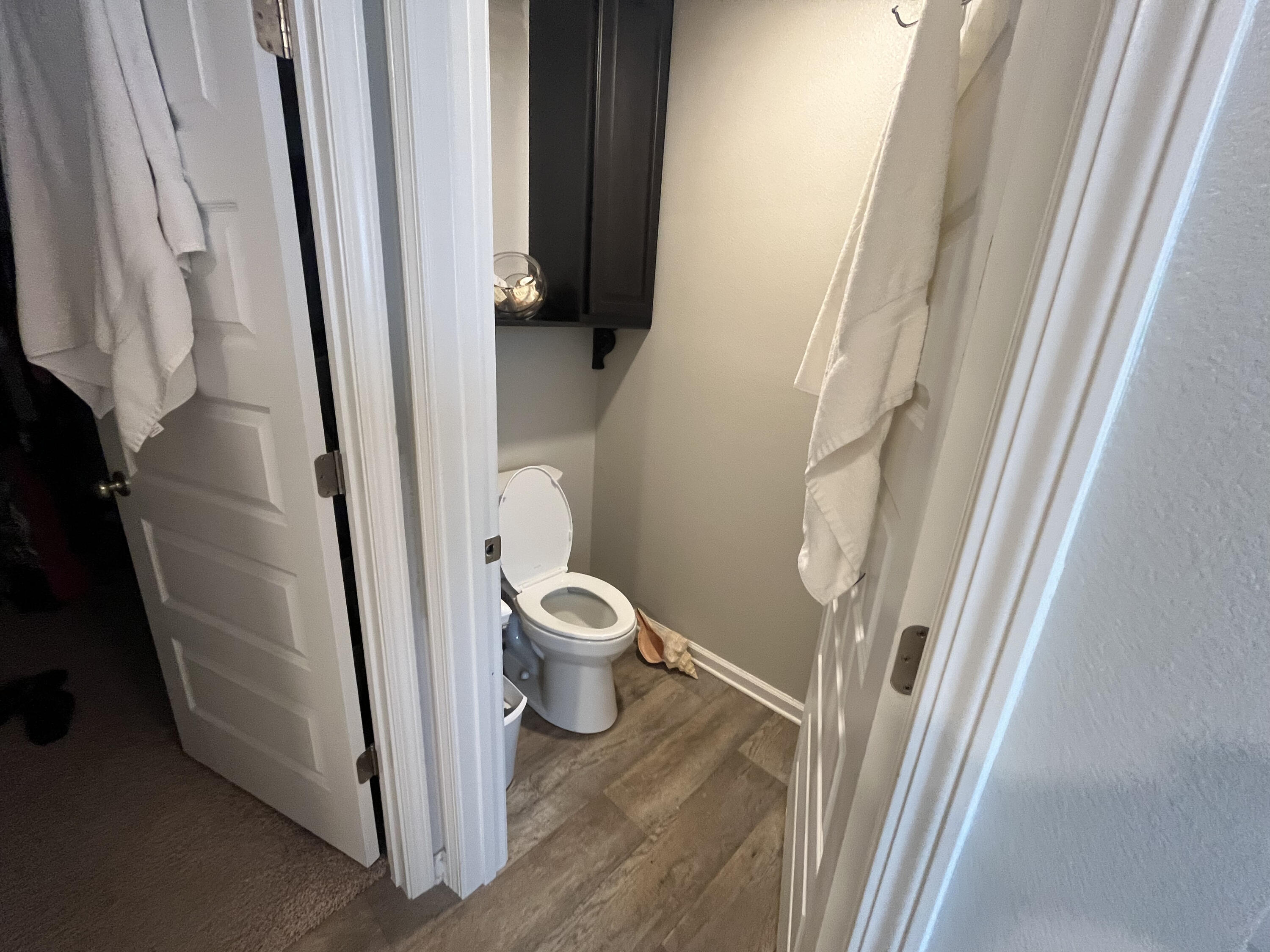 203 This Way Freeport, FL 32439 - Photo 17 of 29 a bathroom with a toilet and a shower