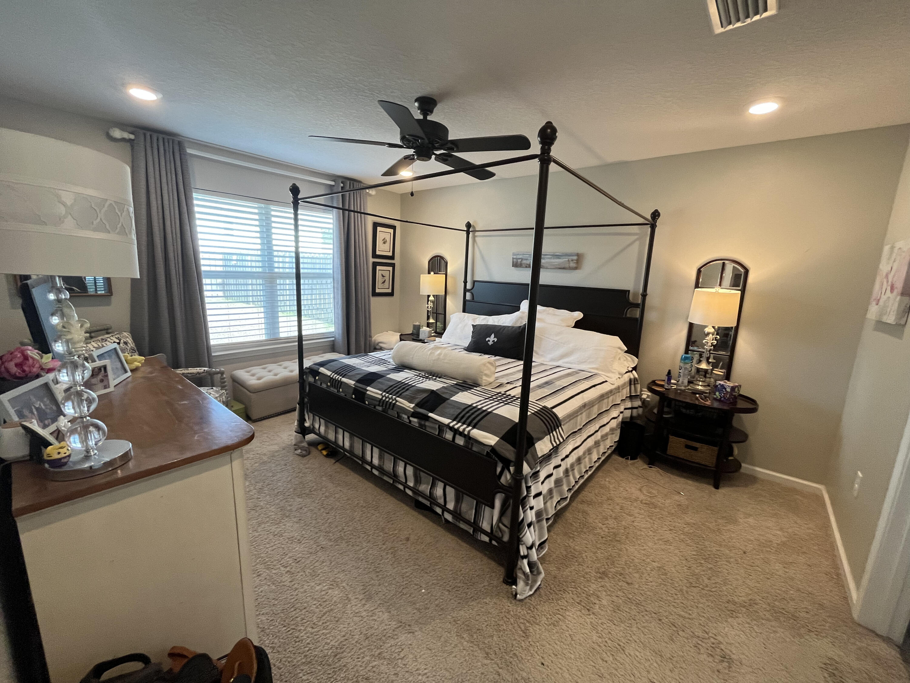 203 This Way Freeport, FL 32439 - Photo 26 of 29 a bedroom with a bed window and couch