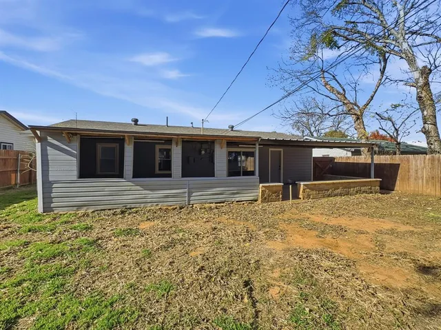 a house view with a garden space