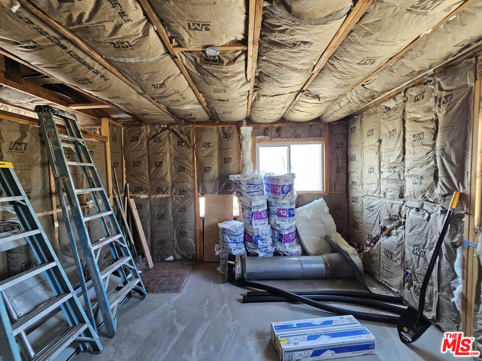 7797 Quartz Road Mojave, CA 93501 - Photo 34 of 49 a view of furniture room with wooden floor