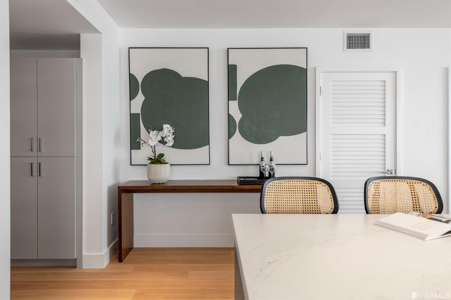 1805 Buchanan Street, Unit 3B San Francisco, CA 94115 - Photo 13 of 55 a bathroom with mirror and window