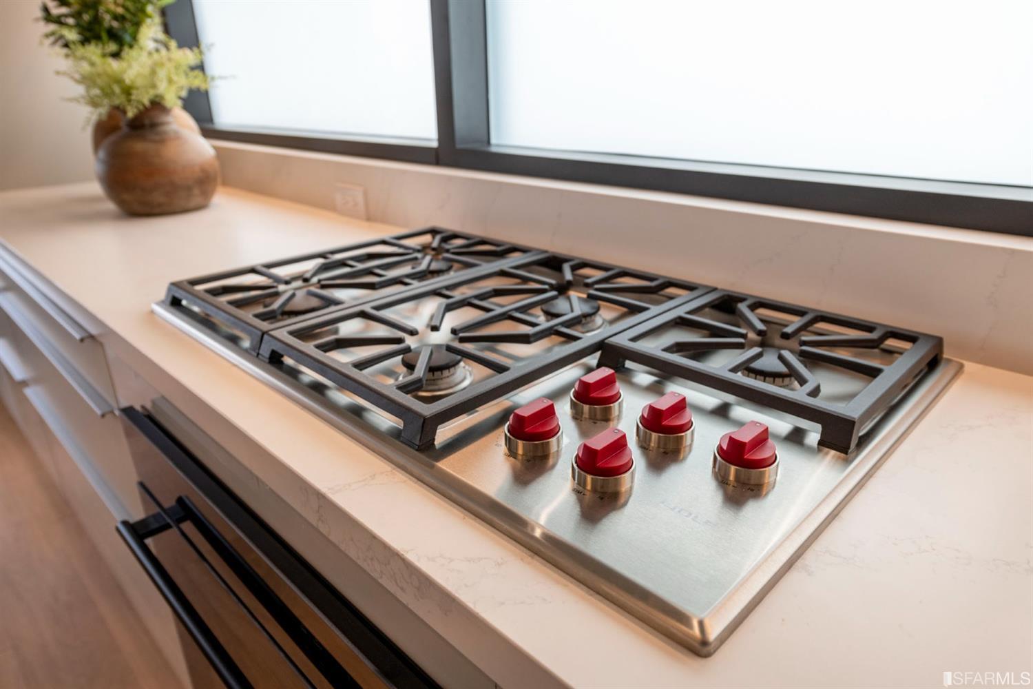 1805 Buchanan Street, Unit 3B San Francisco, CA 94115 - Photo 18 of 55 a stove top oven sitting inside of a kitchen