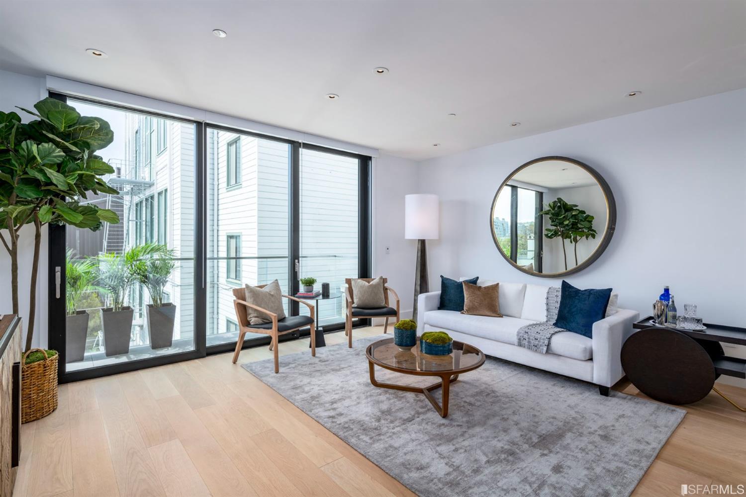 1805 Buchanan Street, Unit 3B San Francisco, CA 94115 - Photo 20 of 55 a living room with furniture and a large window