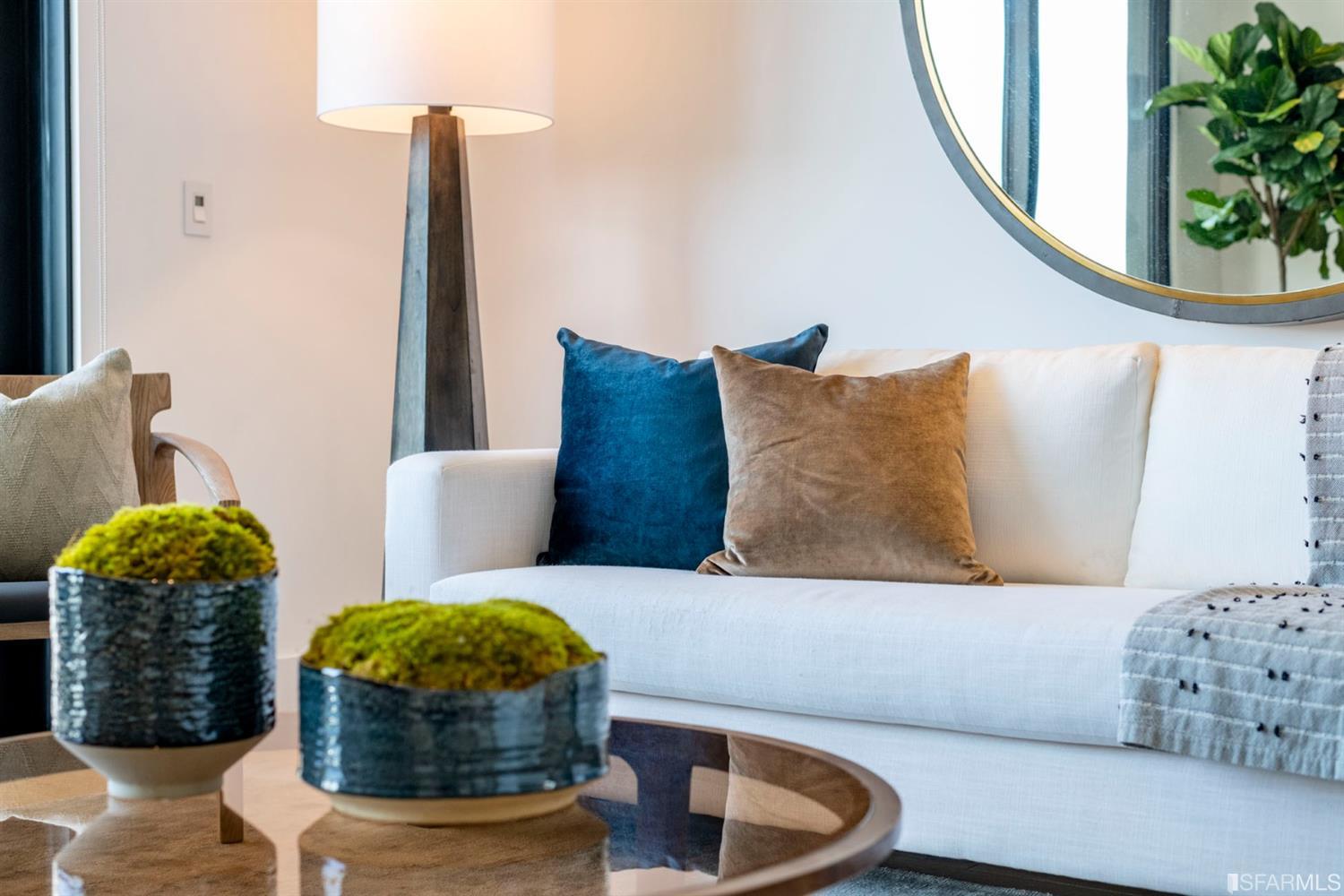1805 Buchanan Street, Unit 3B San Francisco, CA 94115 - Photo 22 of 55 a living room with furniture and a mirror