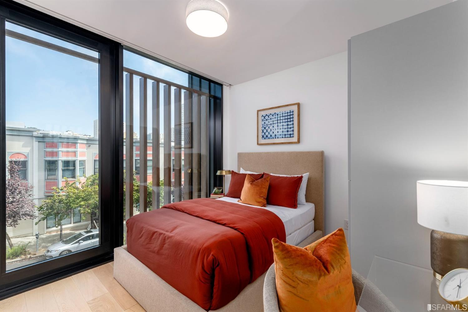 1805 Buchanan Street, Unit 3B San Francisco, CA 94115 - Photo 29 of 55 a bedroom with a bed and window