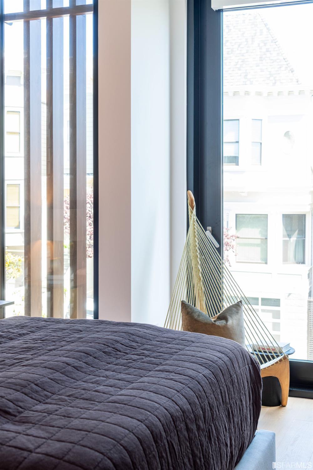 1805 Buchanan Street, Unit 3B San Francisco, CA 94115 - Photo 37 of 55 a bedroom with a bed and a window