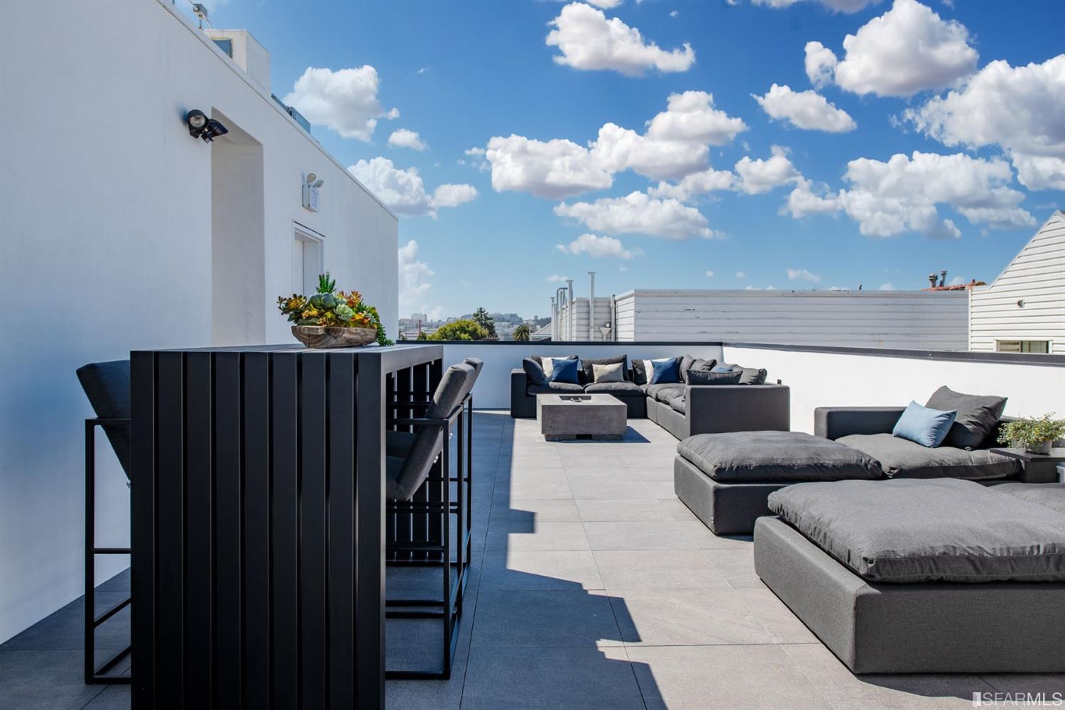 1805 Buchanan Street, Unit 3B San Francisco, CA 94115 - Photo 44 of 55 a living room with lots of white furniture and a chandelier