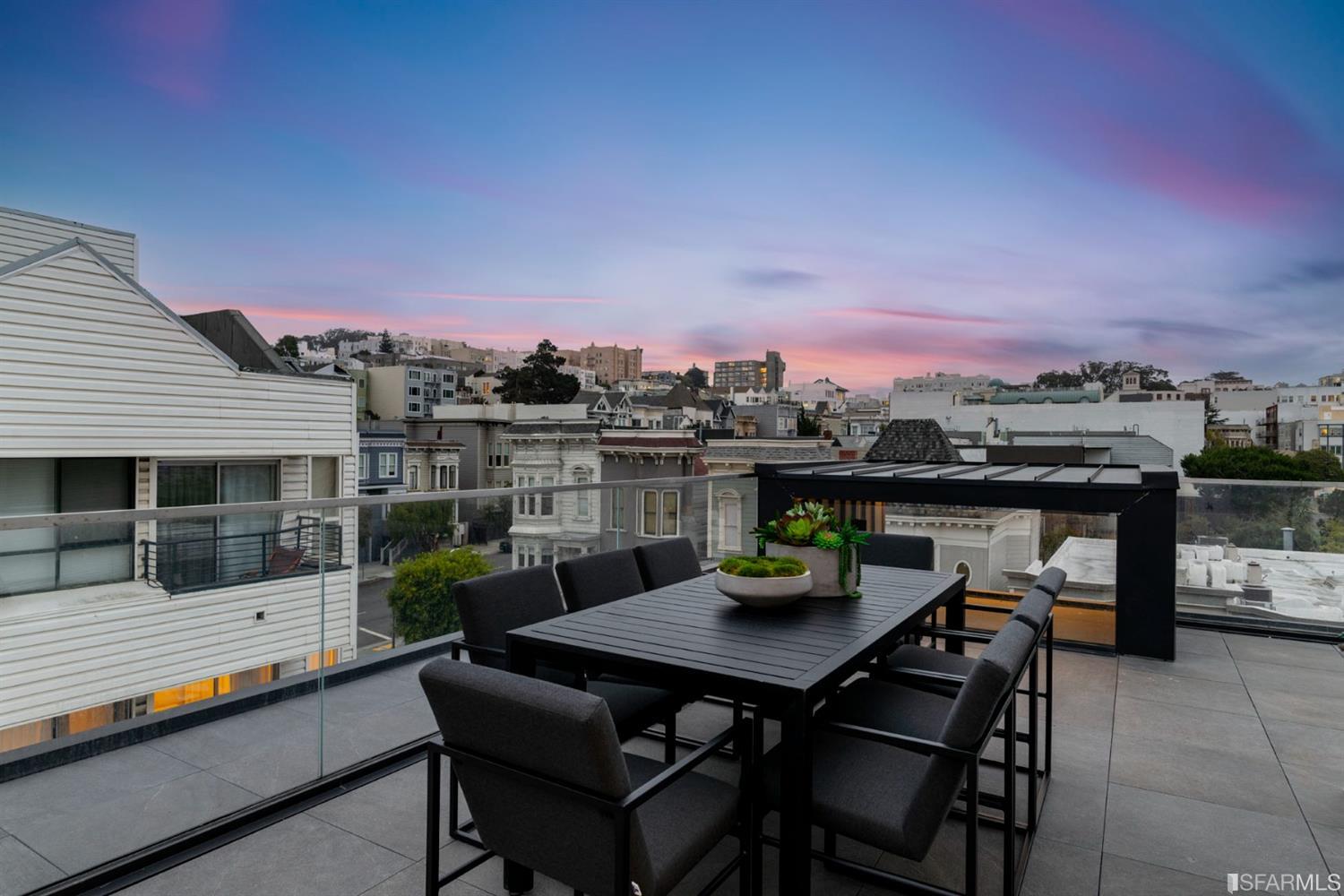 1805 Buchanan Street, Unit 3B San Francisco, CA 94115 - Photo 46 of 55 a view of a terrace with a table and chairs