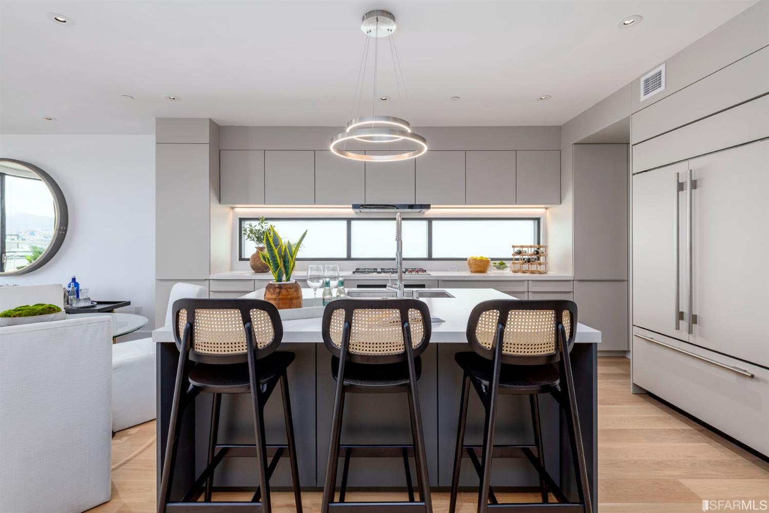 1805 Buchanan Street, Unit 3B San Francisco, CA 94115 - Photo 6 of 55 a view of a dining room with furniture and a window