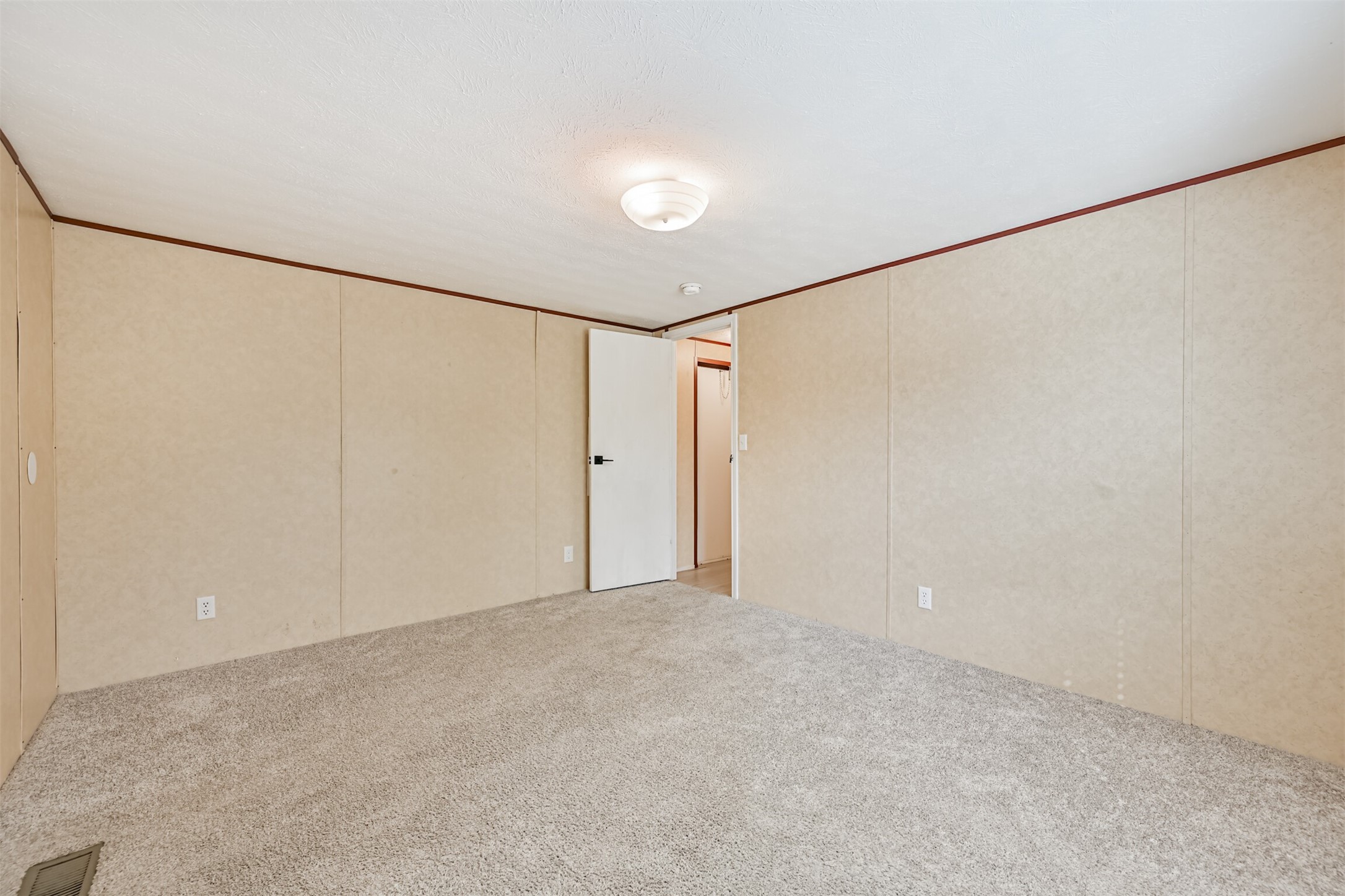 4702 10th Street Bacliff, TX 77518 - Photo 18 of 33 a view of an empty room
