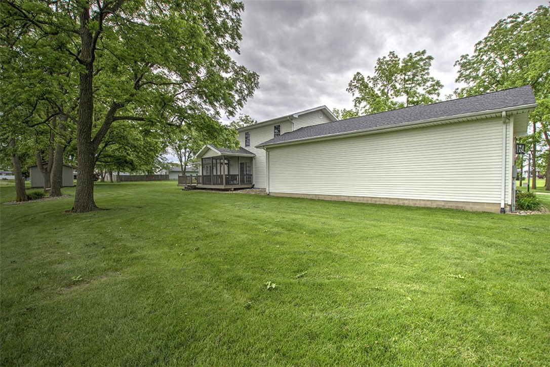 6750 Camp Warren Road Decatur, IL 62521 - Photo 29 of 34 a view of a house with a garden