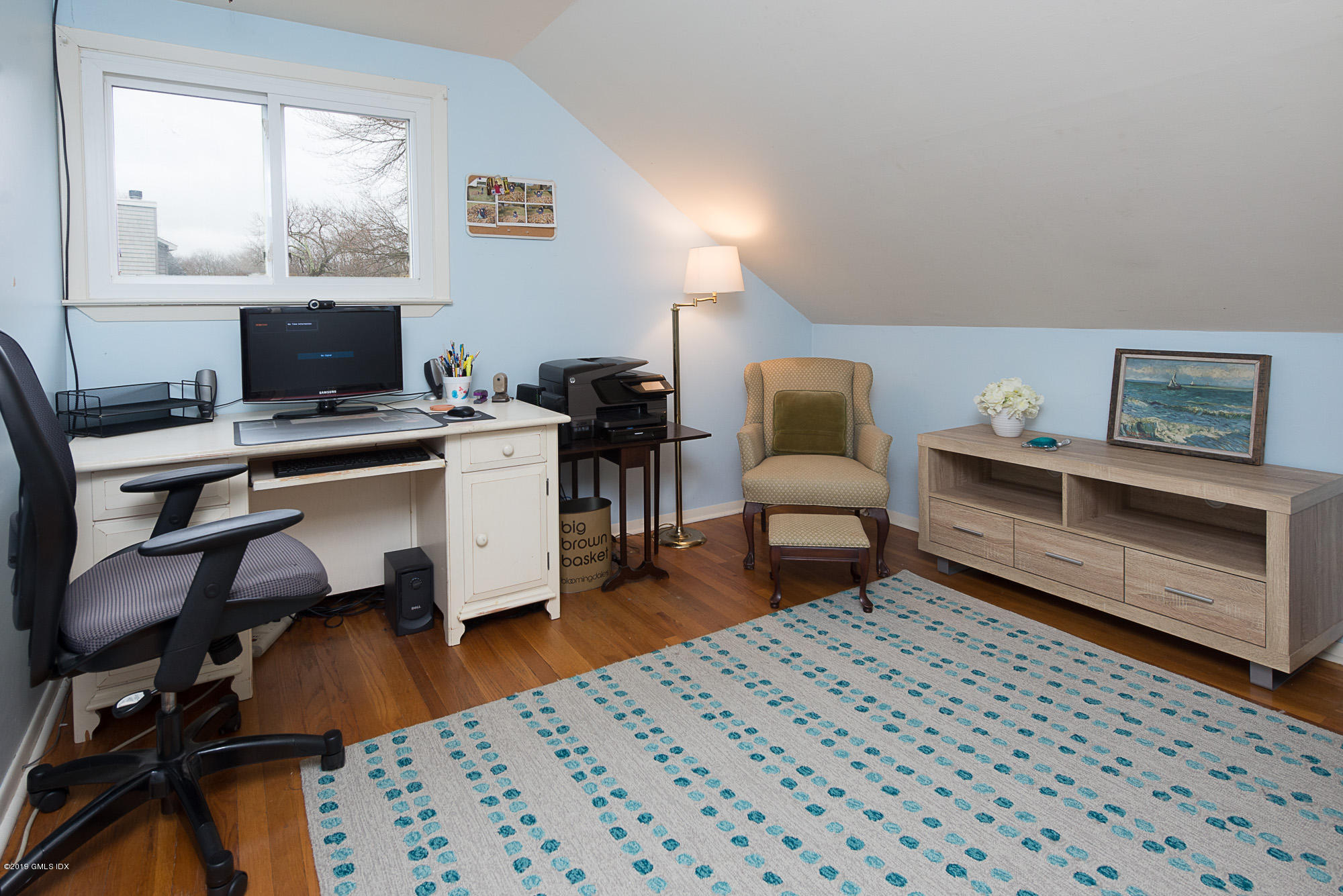 81 Mary Lane Riverside, CT 06878 - Photo 14 of 26 a bedroom with furniture and a window