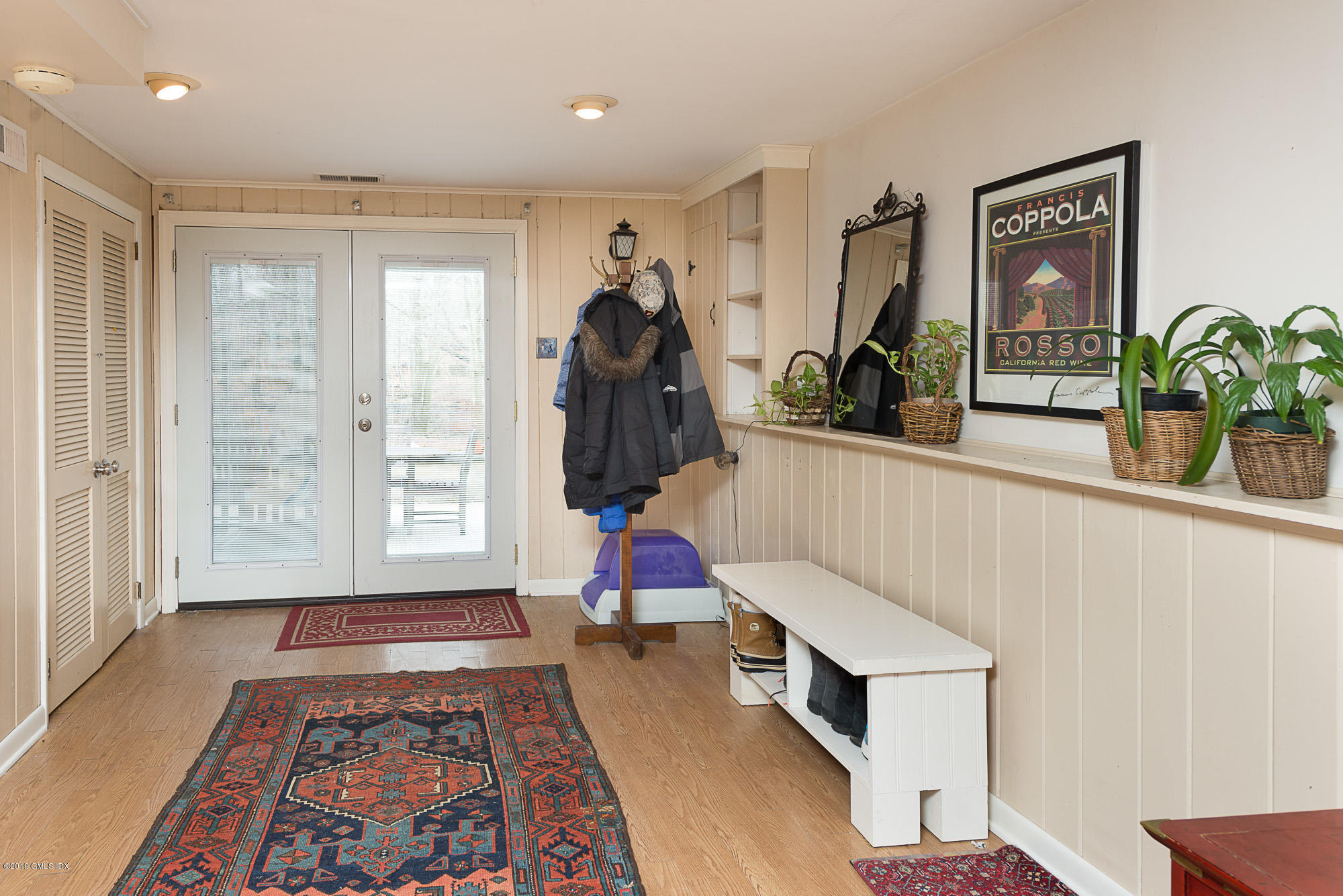 81 Mary Lane Riverside, CT 06878 - Photo 18 of 26 a living room with furniture and a window