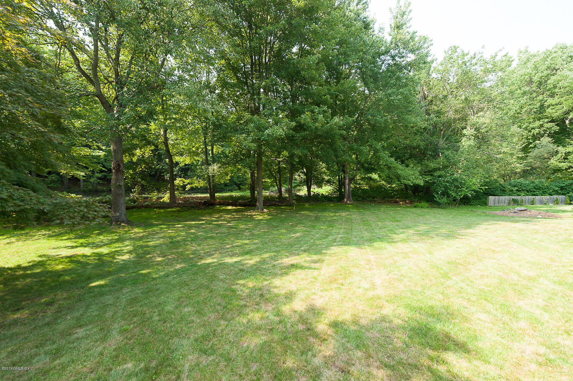 81 Mary Lane Riverside, CT 06878 - Photo 25 of 26 a view of outdoor space with deck and yard