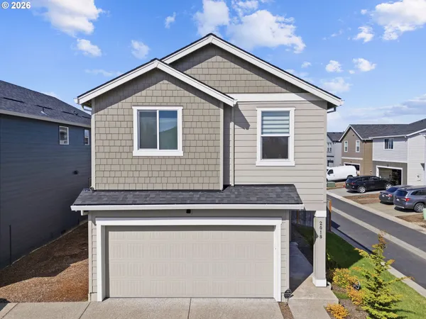a kitchen that has a stove and a table
