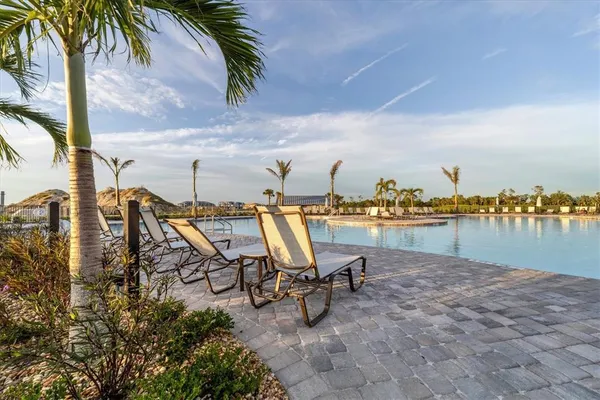 a view of a swimming pool and deck