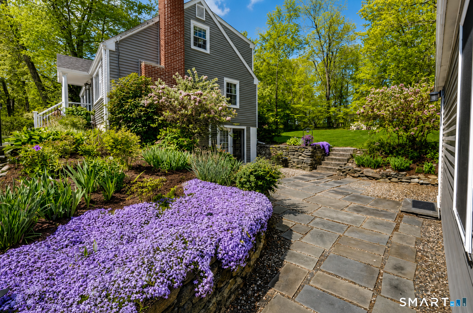 39 Freedom Drive Canton, CT 06019 - Photo 3 of 37 a view of a house with a yard and plants