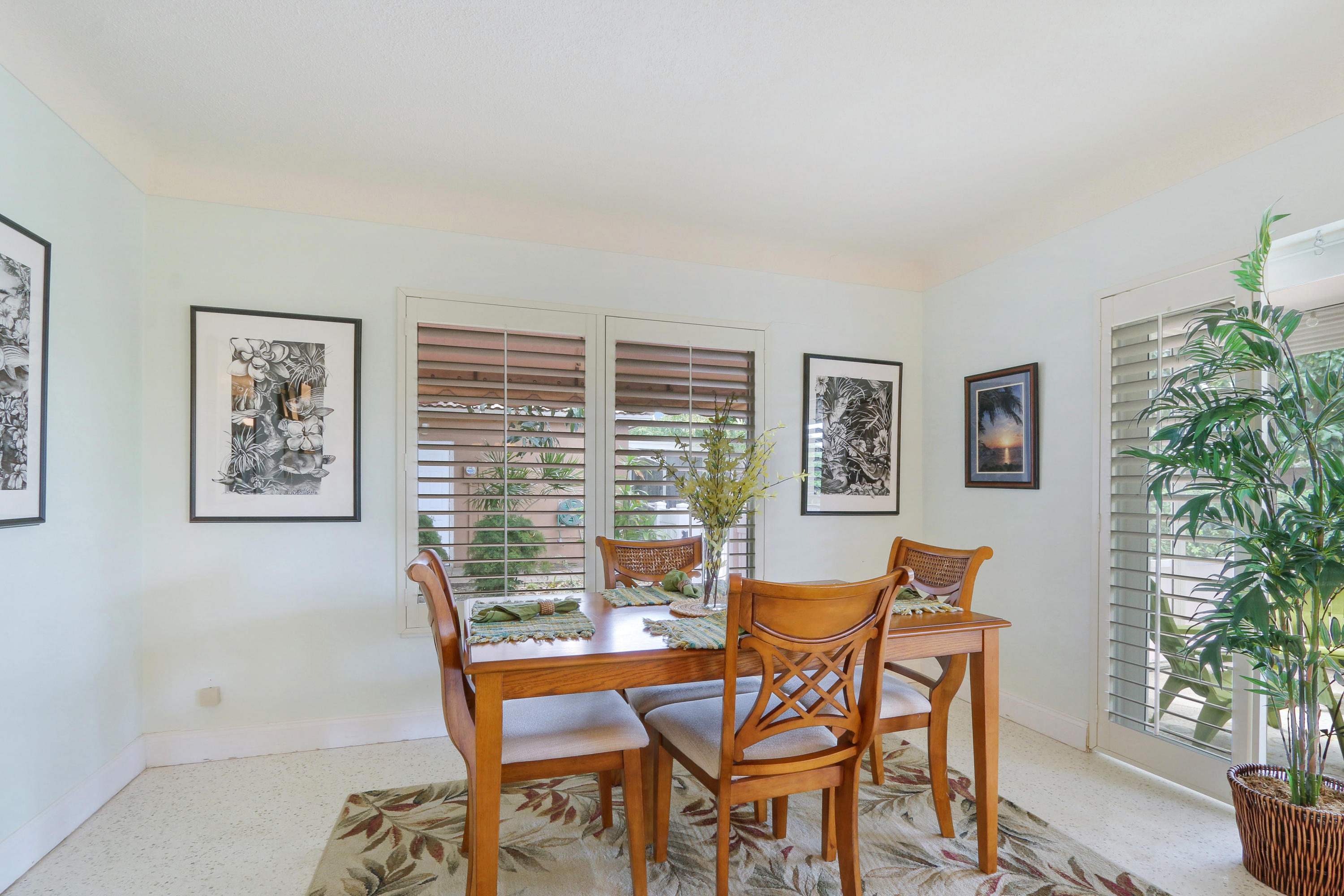 3533 Northeast 6th Drive Boca Raton, FL 33431 - Photo 12 of 23 a dining room with furniture and window