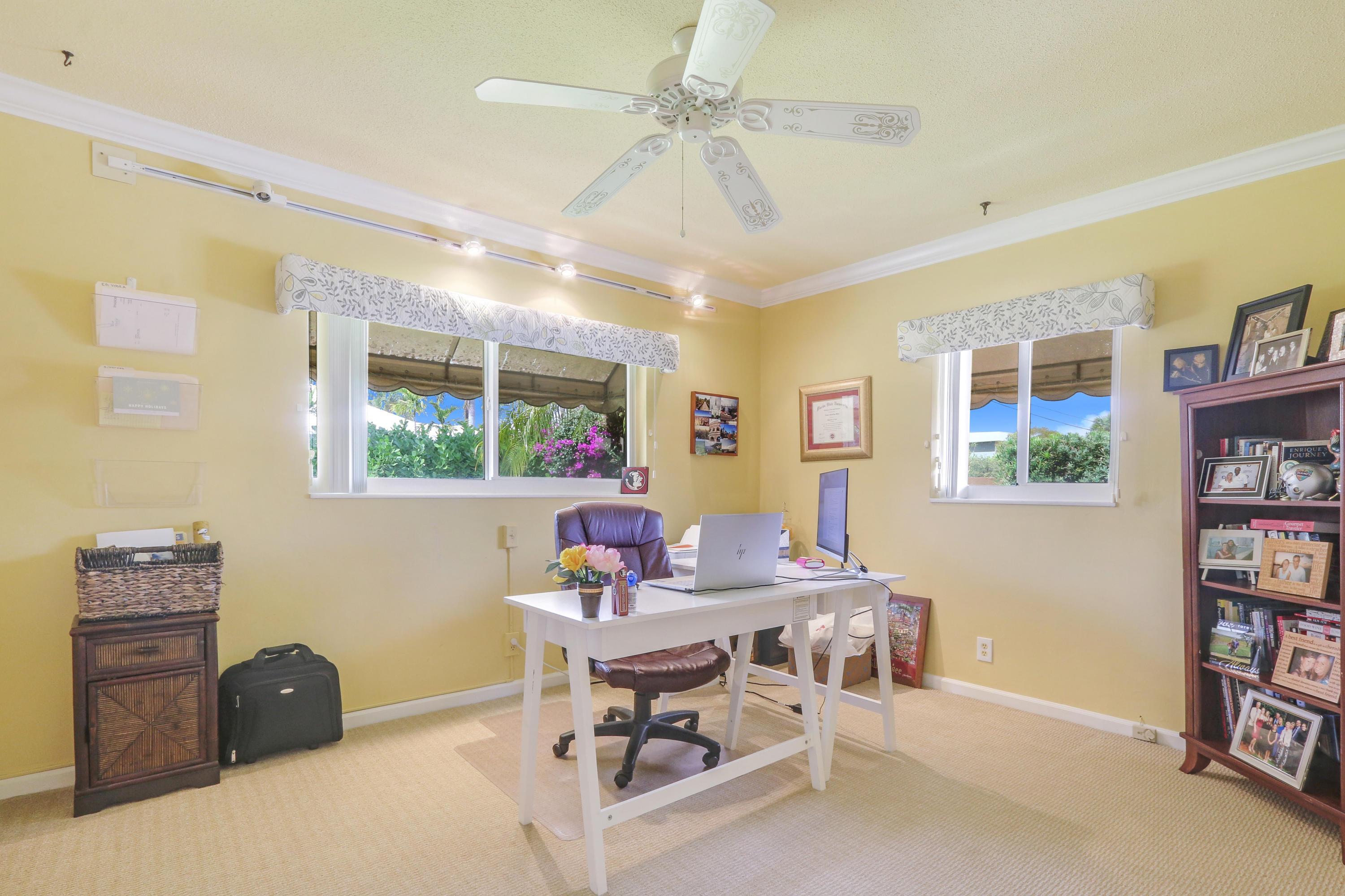3533 Northeast 6th Drive Boca Raton, FL 33431 - Photo 19 of 23 a work room with furniture and a window