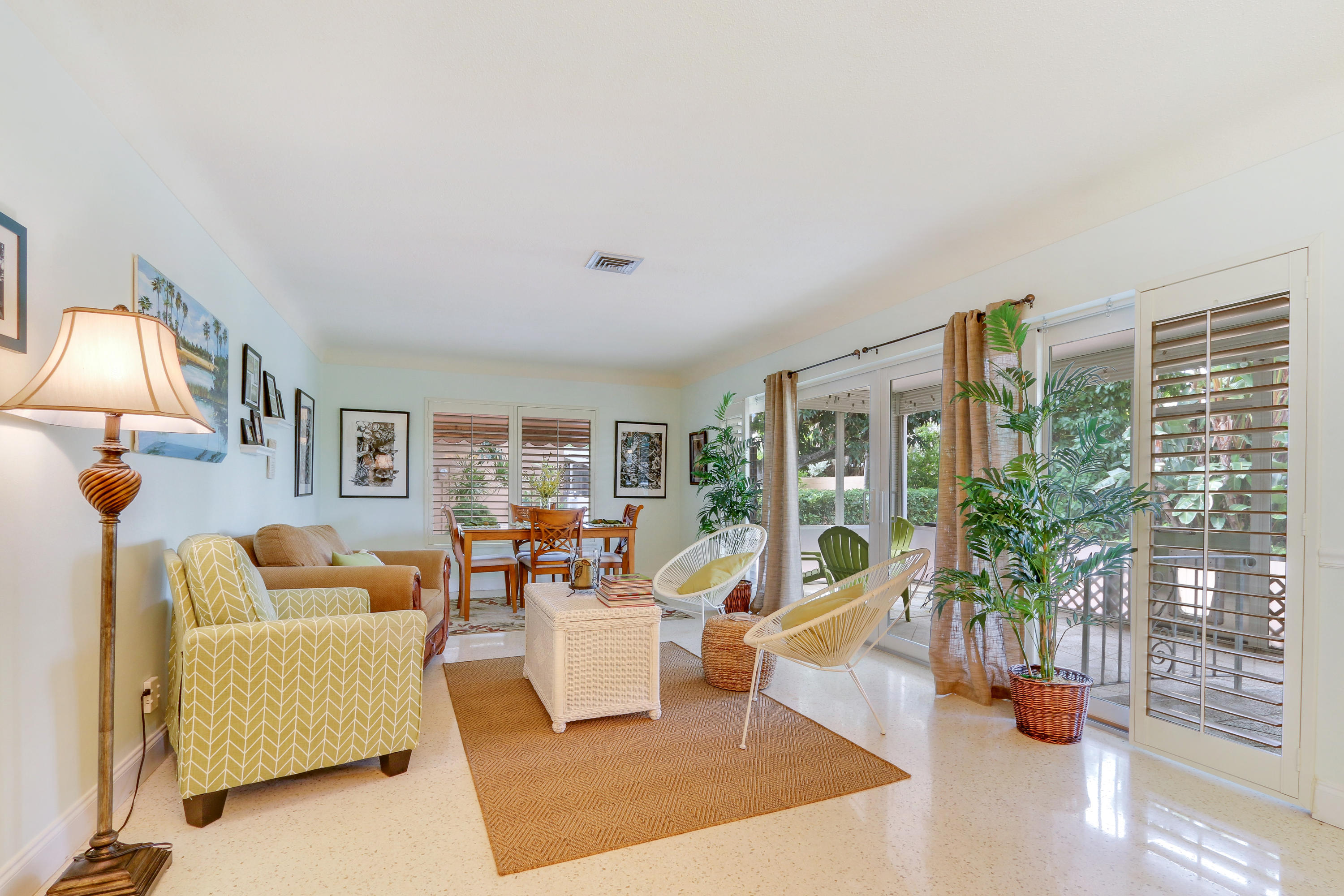 3533 Northeast 6th Drive Boca Raton, FL 33431 - Photo 7 of 23 a living room with furniture and a large window