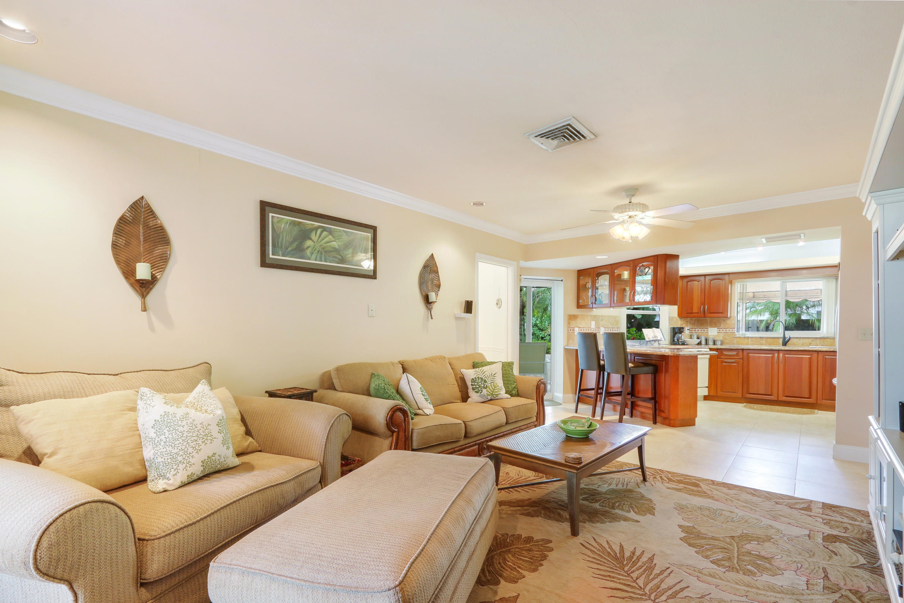 3533 Northeast 6th Drive Boca Raton, FL 33431 - Photo 8 of 23 a living room with furniture and a wooden floor