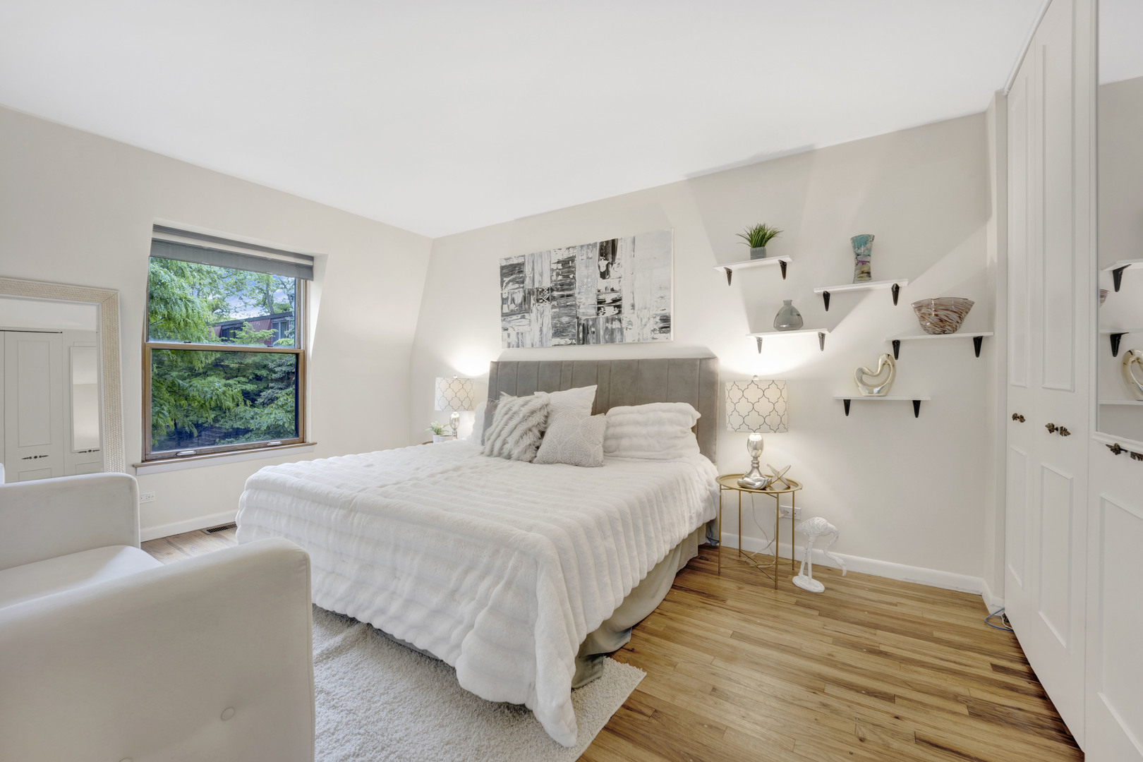 1252 West Westgate Terrace Chicago, IL 60607 - Photo 11 of 24 a bedroom with a bed and a large window