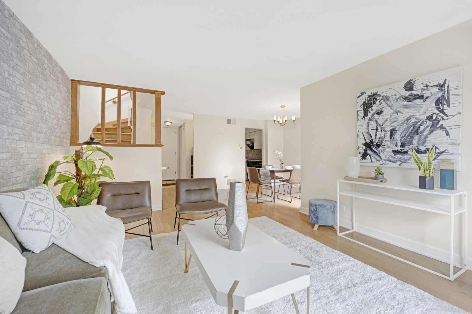 1252 West Westgate Terrace Chicago, IL 60607 - Photo 3 of 24 a living room with furniture and a wooden floor