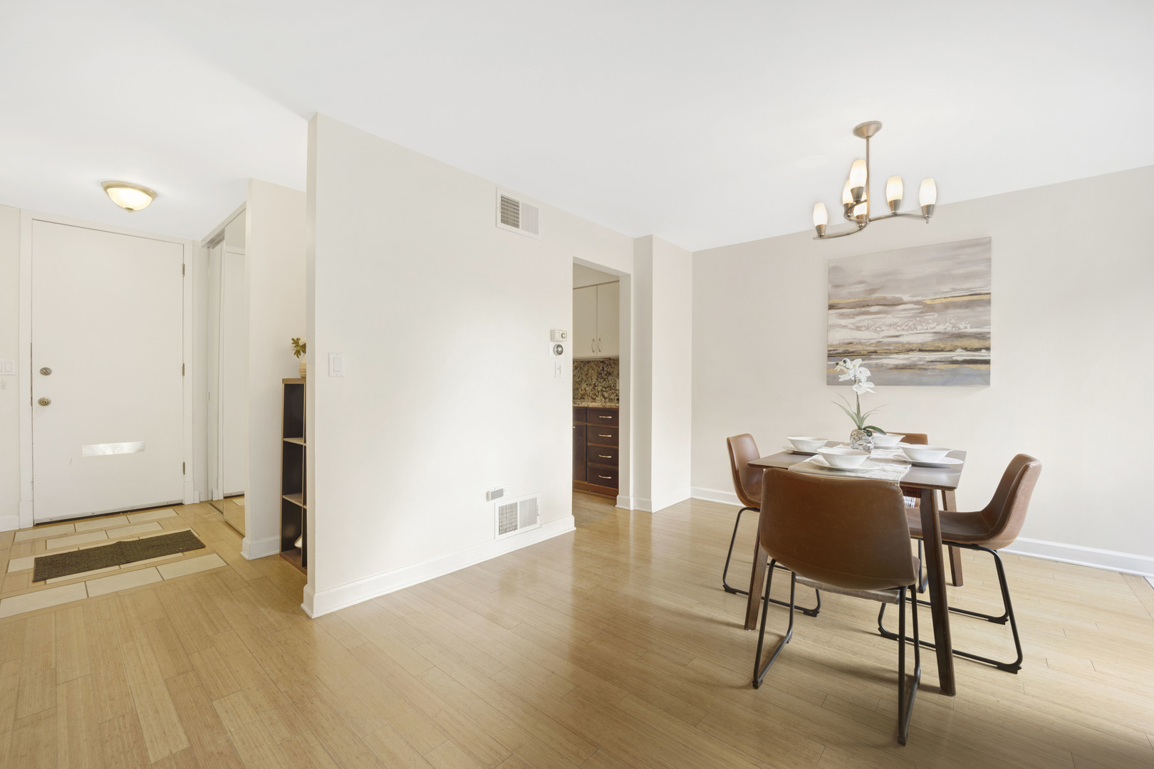 1252 West Westgate Terrace Chicago, IL 60607 - Photo 6 of 24 a view of a dining room with furniture and window