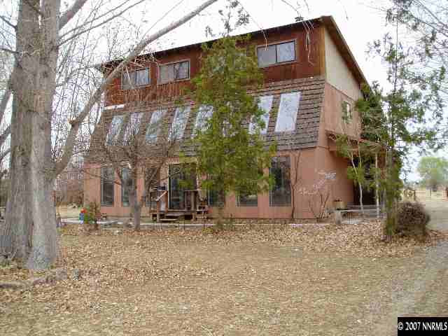 7250 Reno Highway Fallon, NV 89406 - Photo 1 of 6 a view of a house with a yard