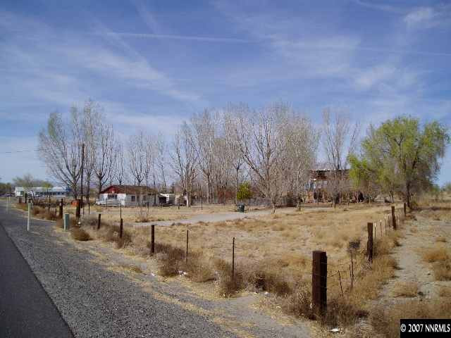 7250 Reno Highway Fallon, NV 89406 - Photo 4 of 6 a view of a yard with trees in the background