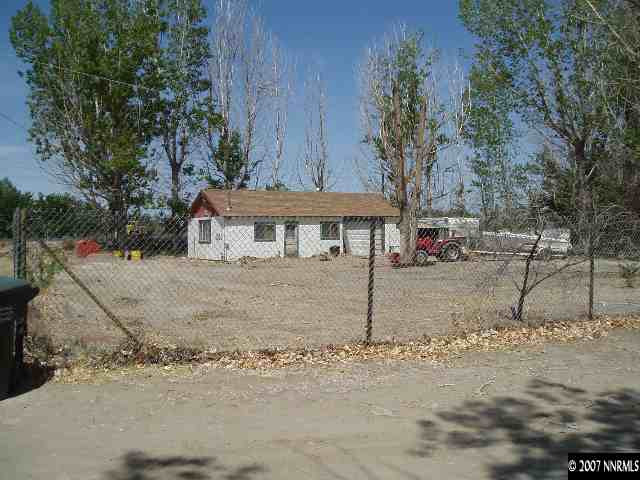 7250 Reno Highway Fallon, NV 89406 - Photo 6 of 6 a front view of a house with a yard