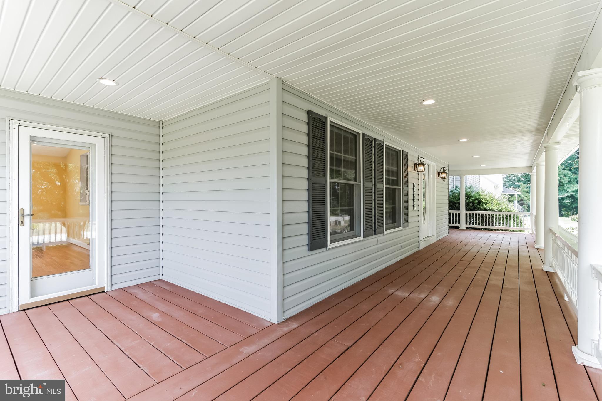 7035 Decoy Drive Owings, MD 20736 - Photo 4 of 61 Covered And Cozy Wrap Around Porch