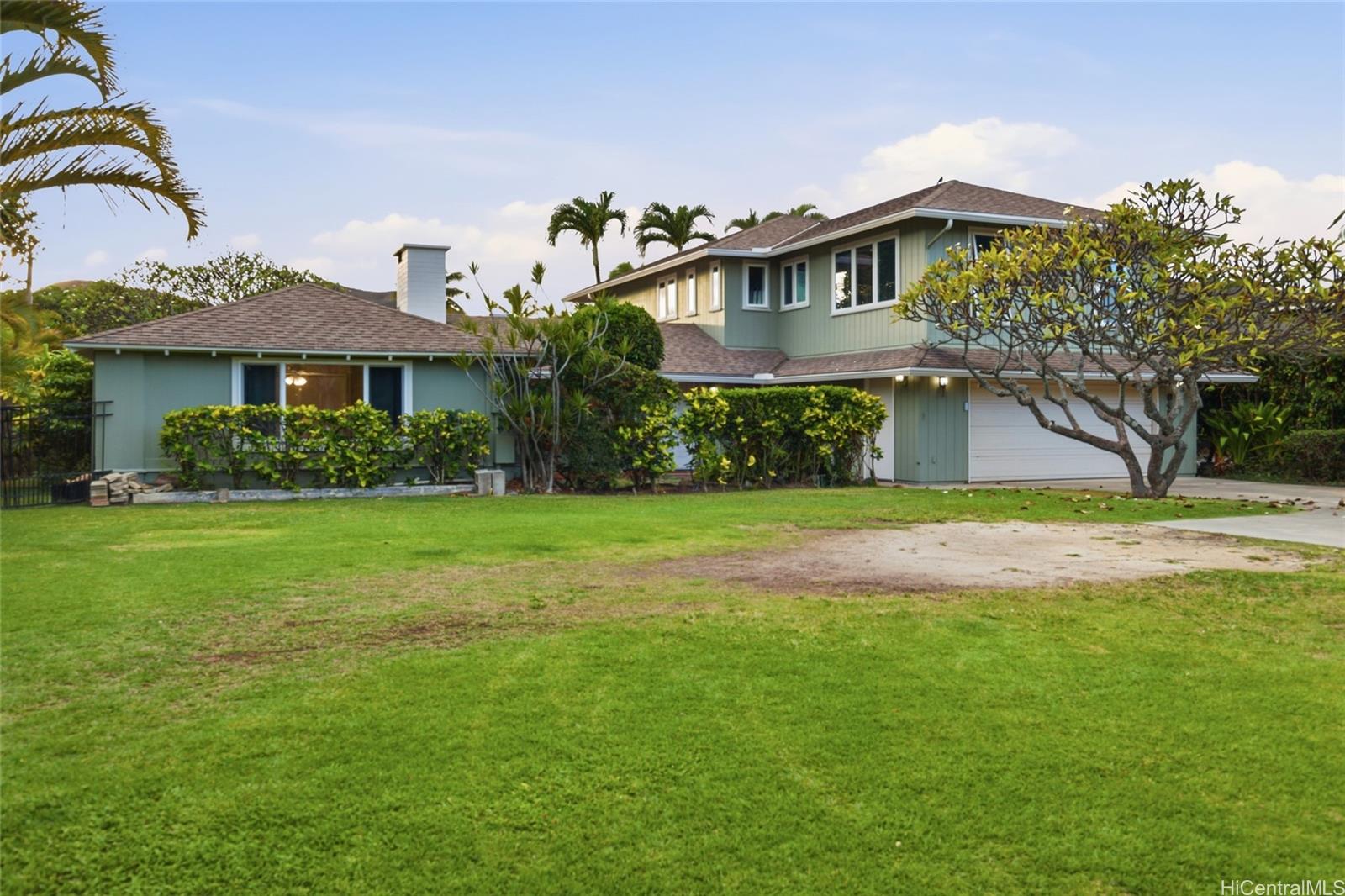 845 North Kalaheo Avenue Kailua, HI 96734 - Photo 2 of 18 a front view of house with yard and green space