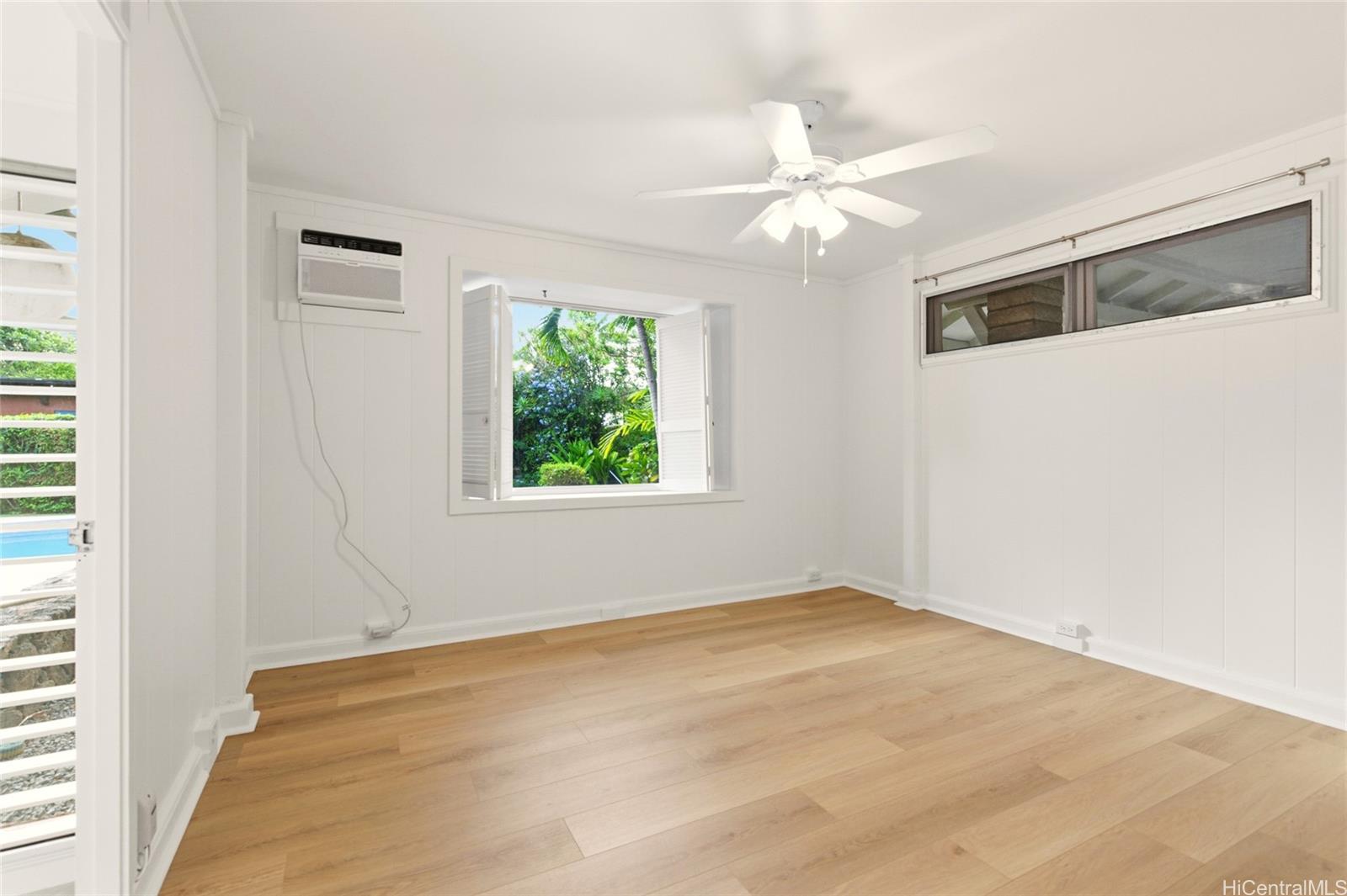 845 North Kalaheo Avenue Kailua, HI 96734 - Photo 10 of 18 an empty room with windows and fan