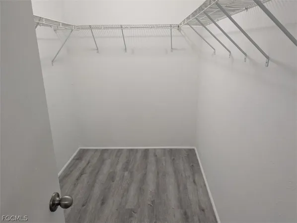 a view of a room with racks on the wall