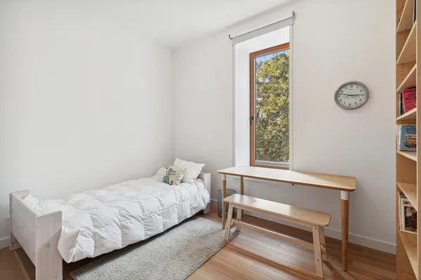 a living room with furniture and a gate