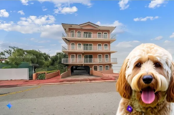 a room with furniture and wooden floor