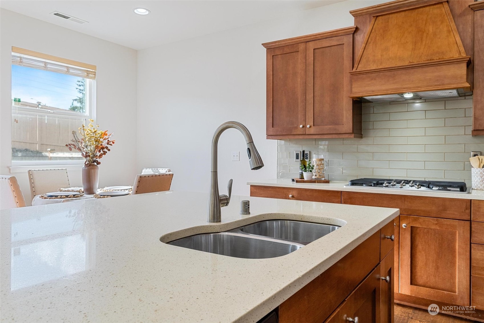 4120 183rd Place Southeast Bothell, WA 98012 - Photo 14 of 39 a kitchen with a sink and a stove top oven