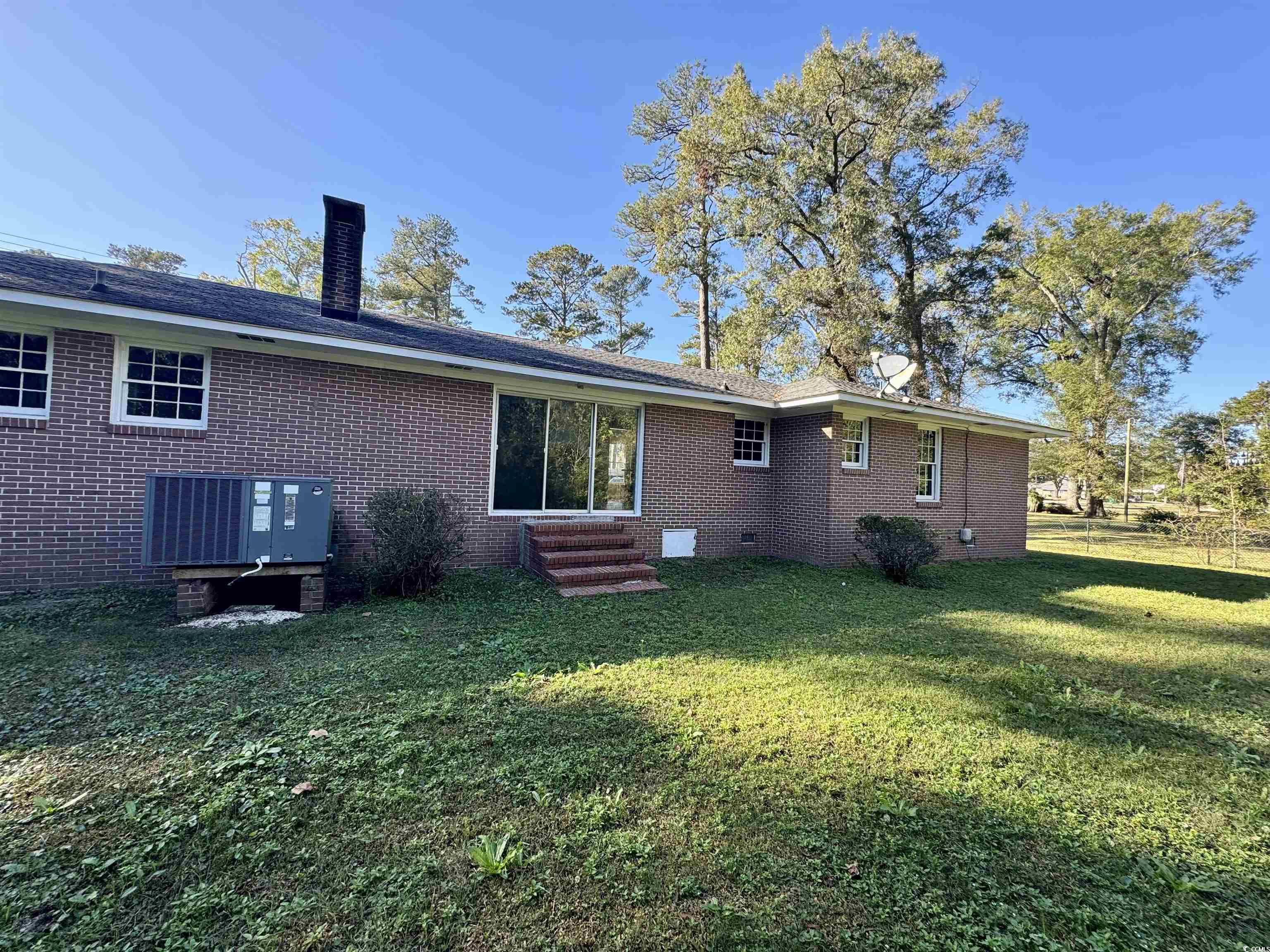 409 North Main Street Hemingway, SC 29554 - Photo 27 of 27 Back of property featuring a lawn